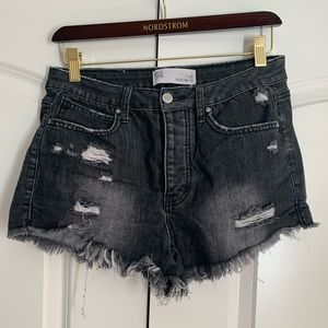 Distressed black shorts
